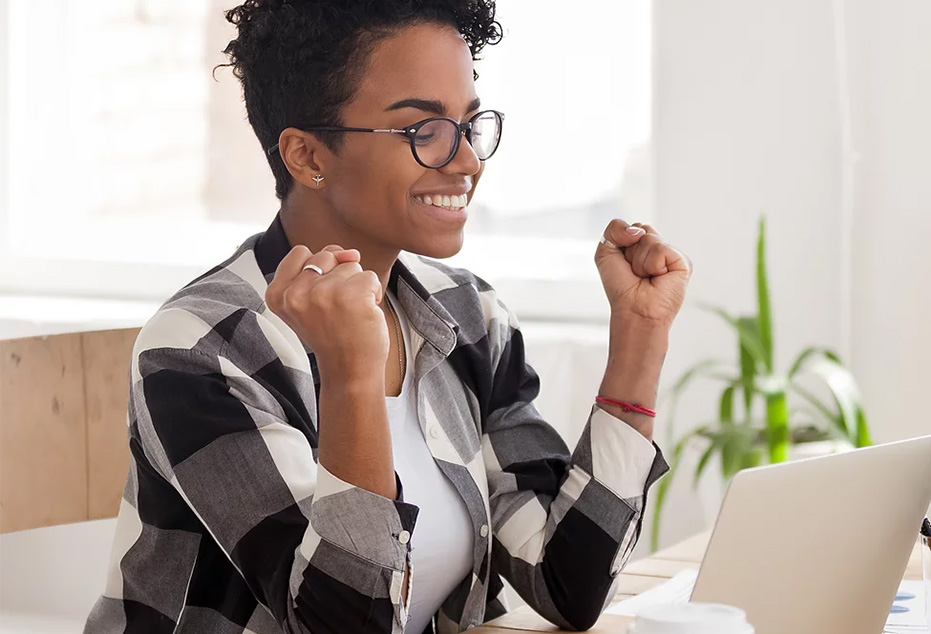 Business owner using a computer to contact us